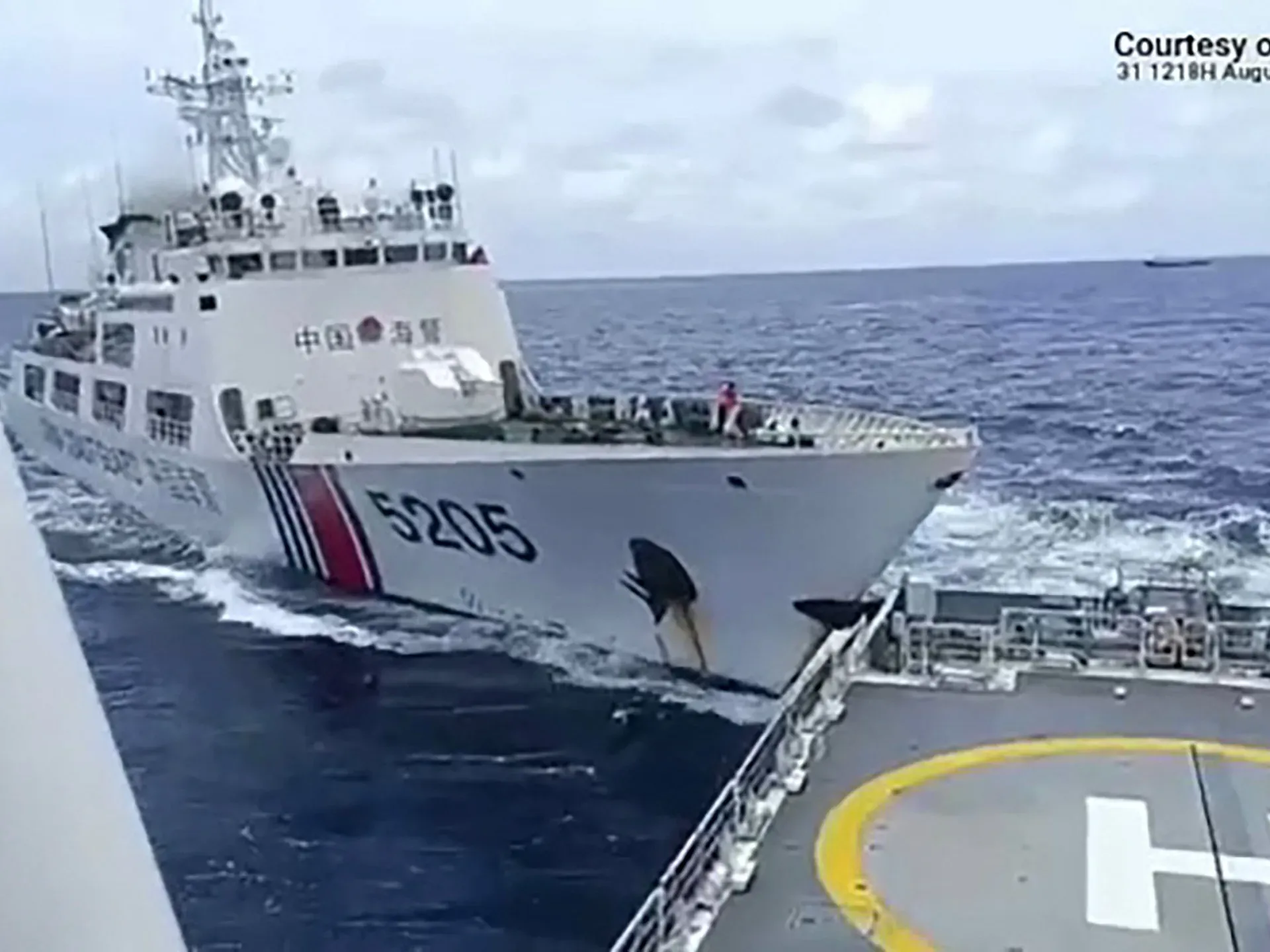 Philippine Coast Guard ship in standoff with China returns to port