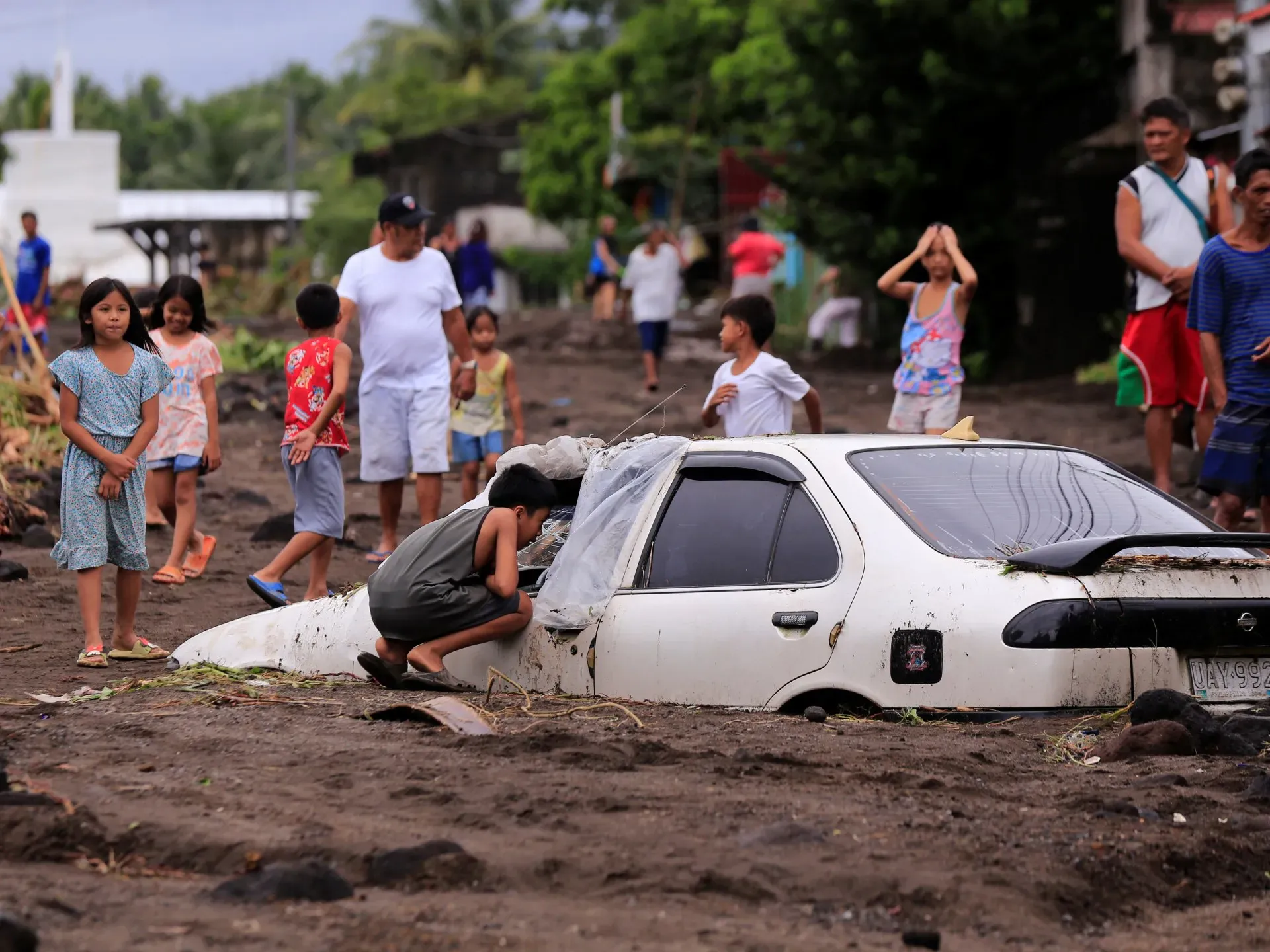 Photos: Thousands evacuated as tropical storm batters Philippines