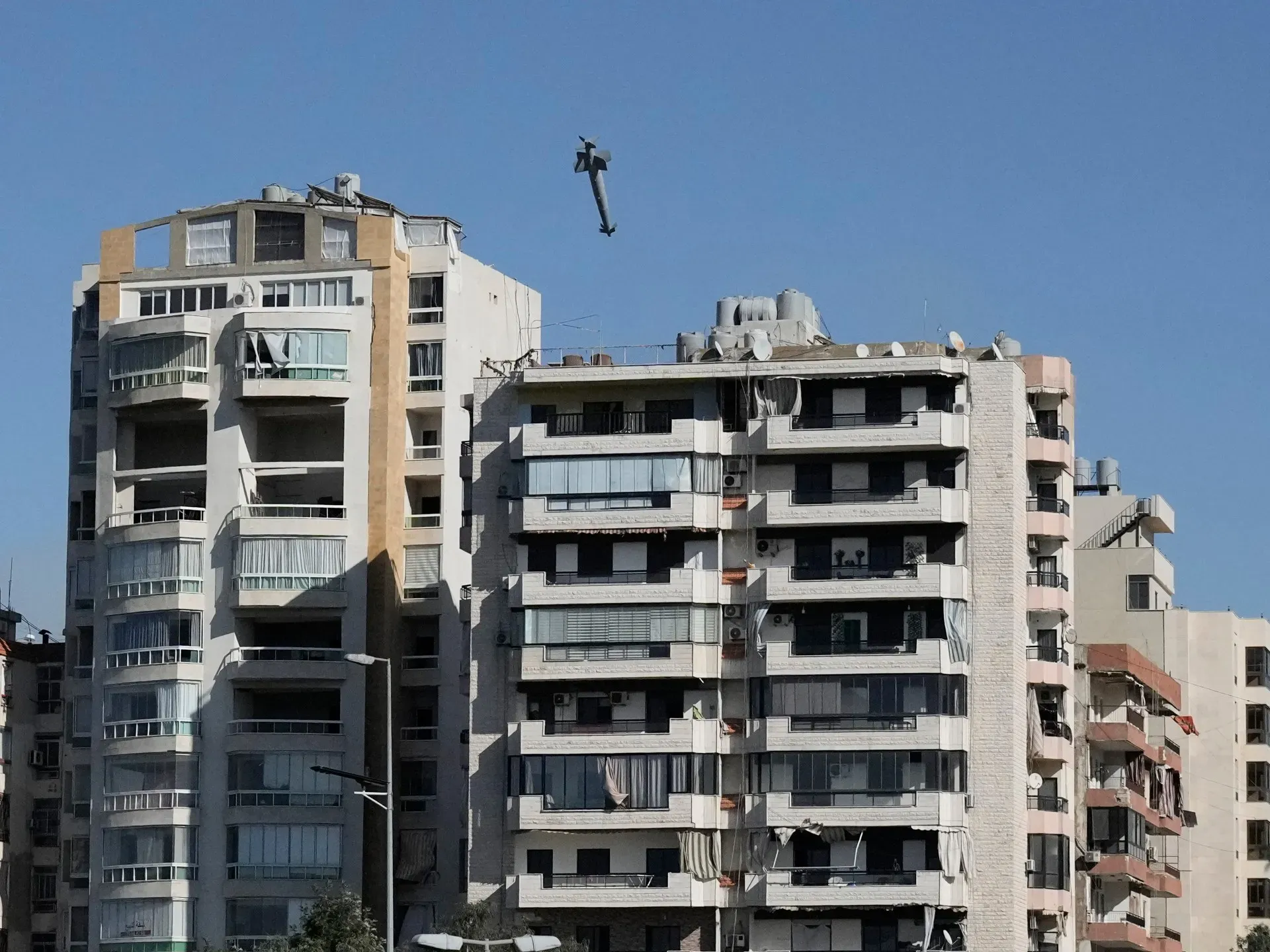 Images capture exact moment Israeli missile hit building in Beirut