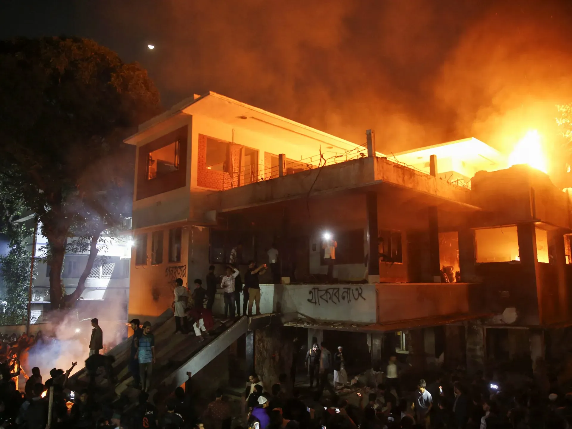 Bangladesh protesters torch family home of ousted PM Sheikh Hasina