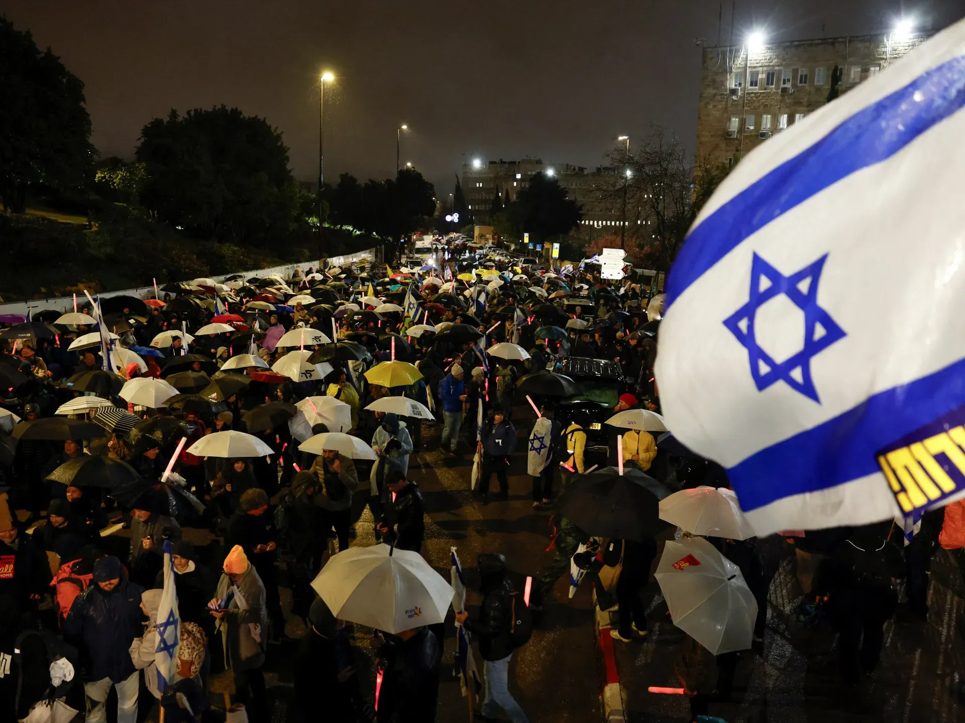 Analysis: Israelis protest as Netanyahu focuses on securing political power