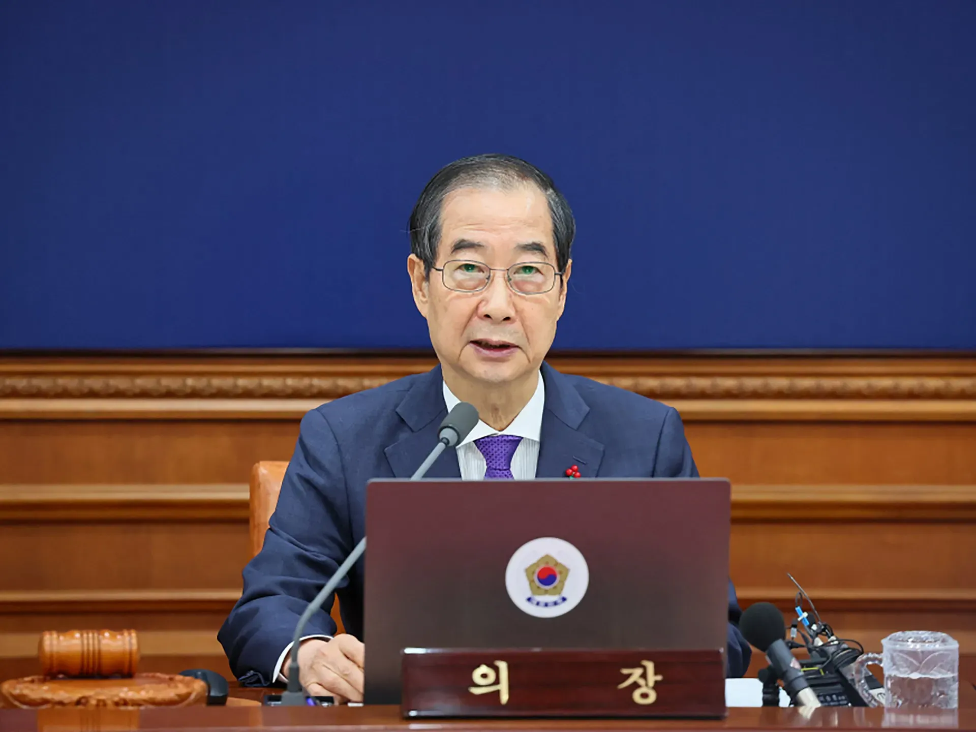 South Korean court reinstates impeached prime minister as acting president