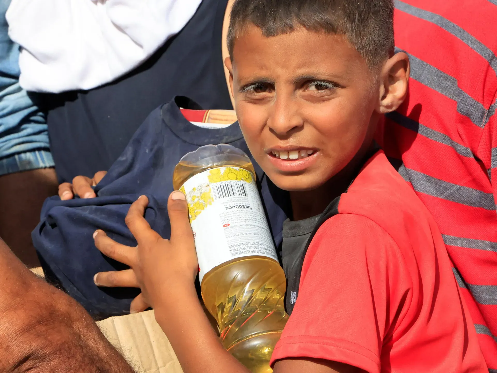 Photos: Thousands of Palestinians crowd a controversial aid centre in Gaza