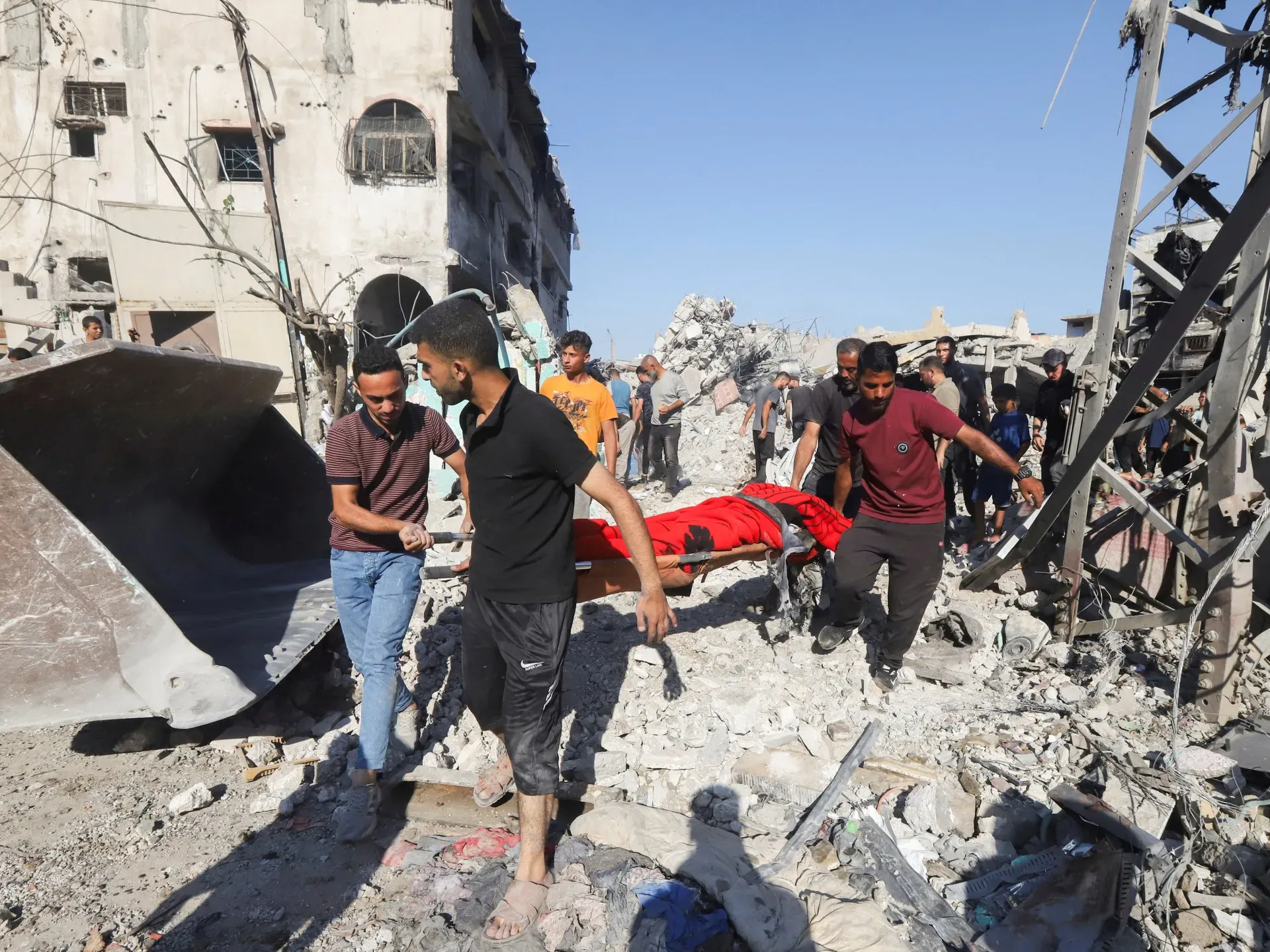 Israeli attacks kill at least 51 as Trump signals progress in Gaza talks