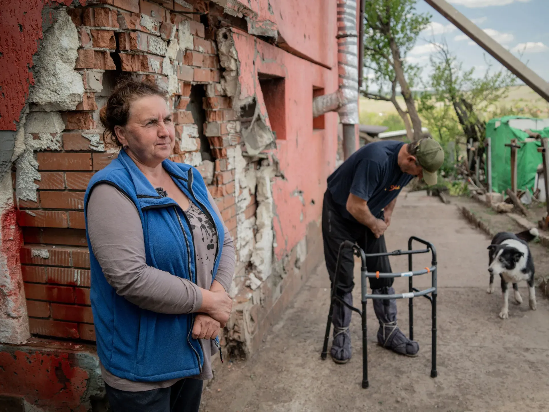 Ukrainian farmers risk lives to clear mines with rakes and tractors