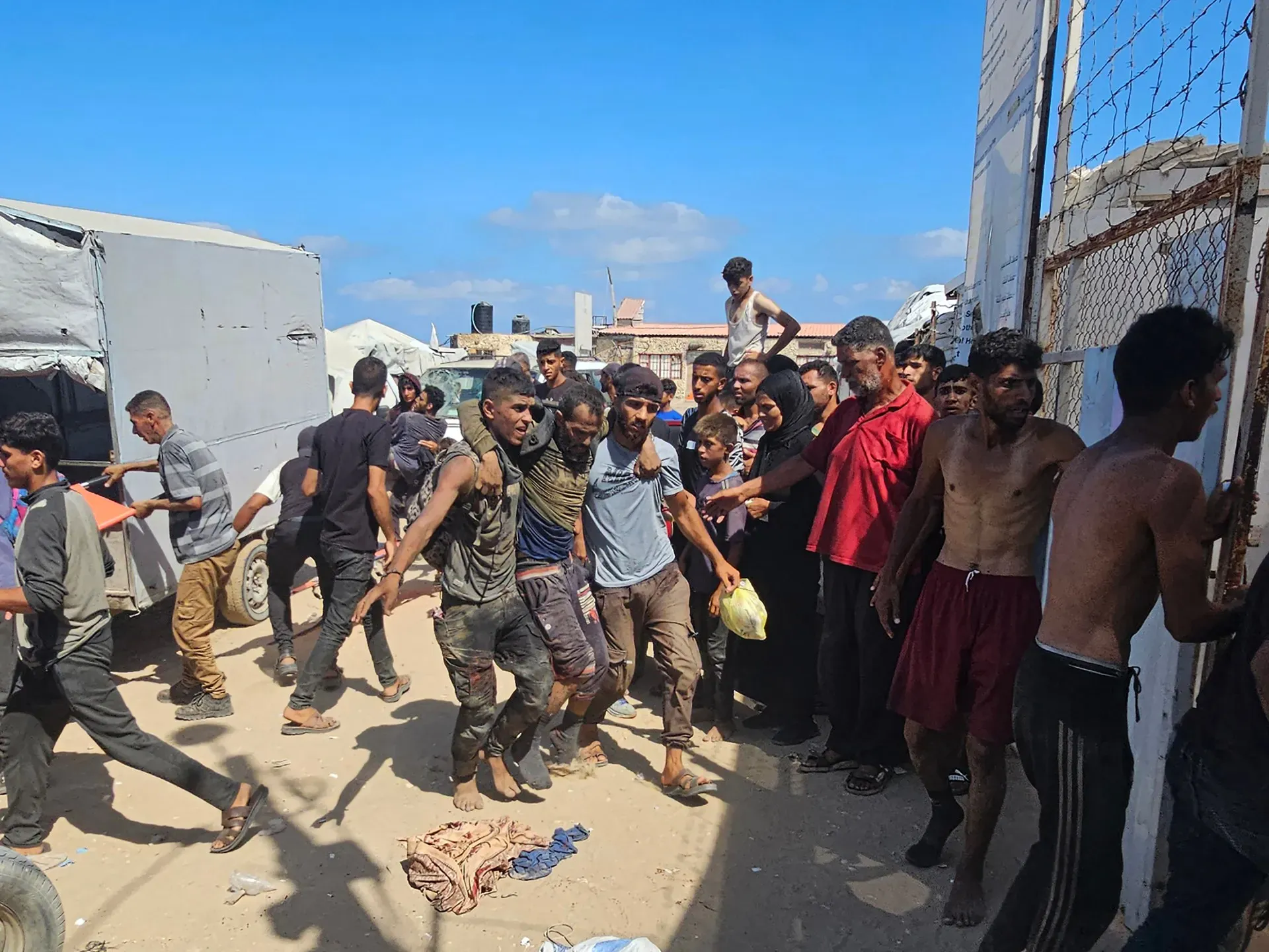 Dozens killed by Israel at aid site in Gaza, children dying of malnutrition