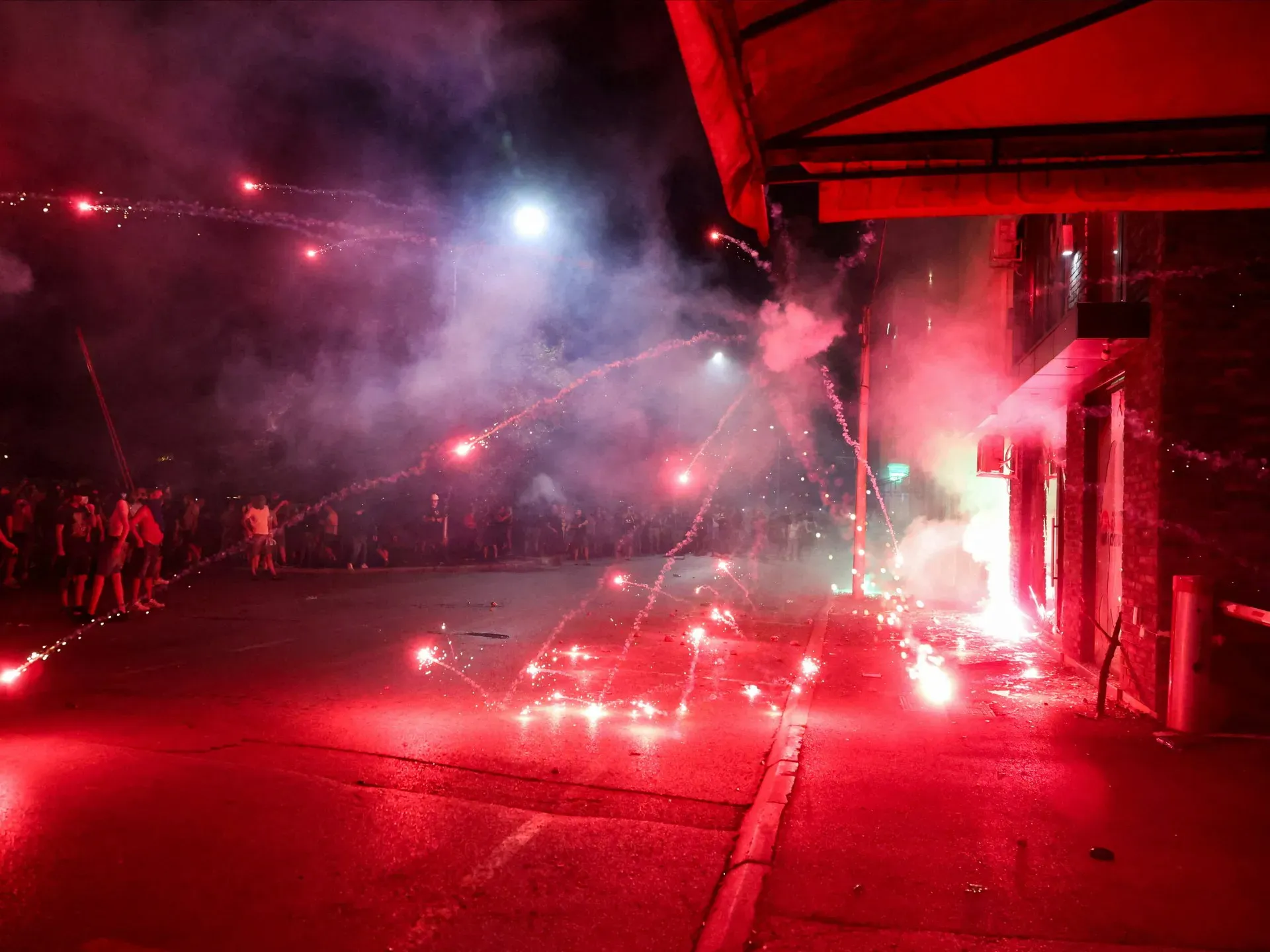 Antigovernment protesters clash with police in several Serbian cities