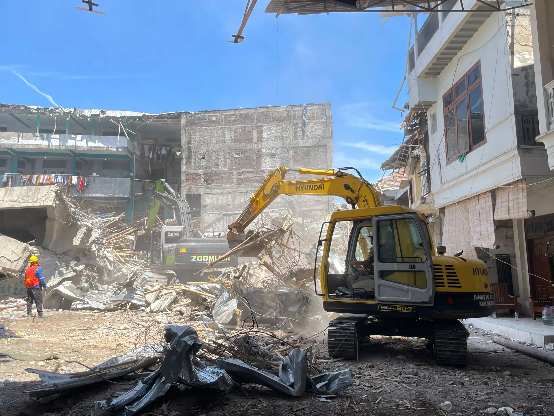 Death toll from Indonesia school collapse rises to 14 as more victims found