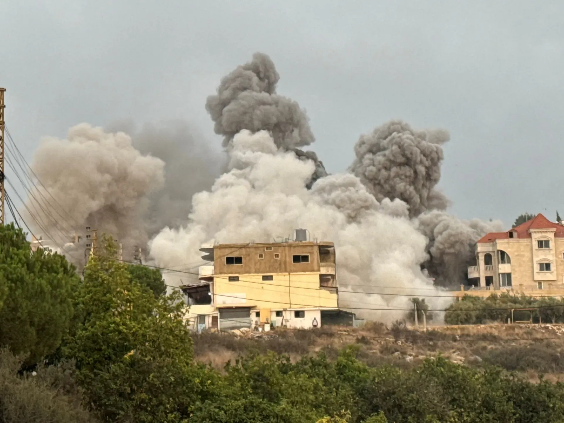 Israel launches new wave of air attacks on Lebanon, straining fragile truce